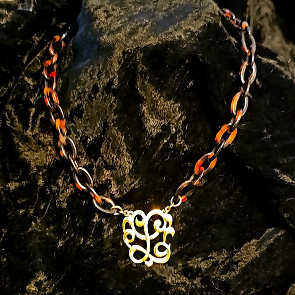 Beautiful Necklace with Gold tone L, 18 inches Plus a matching Bracelet